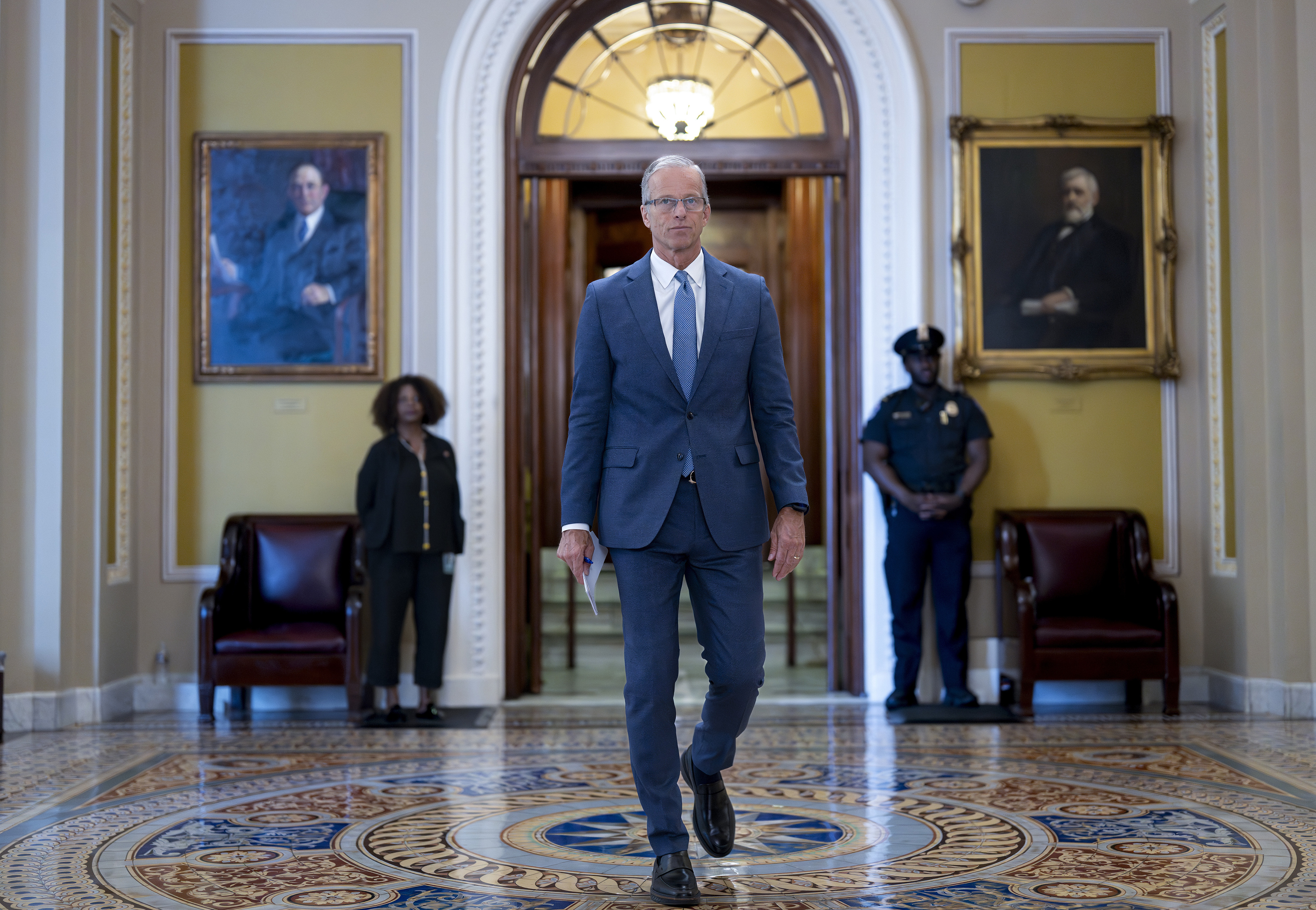 Senate Majority Leader John Thune, R-S.D., leaves the chamber as Republicans work on their a final push to advance President Donald Trump's big tax breaks and spending cuts package, at the Capitol in Washington, Monday, June 30, 2025.