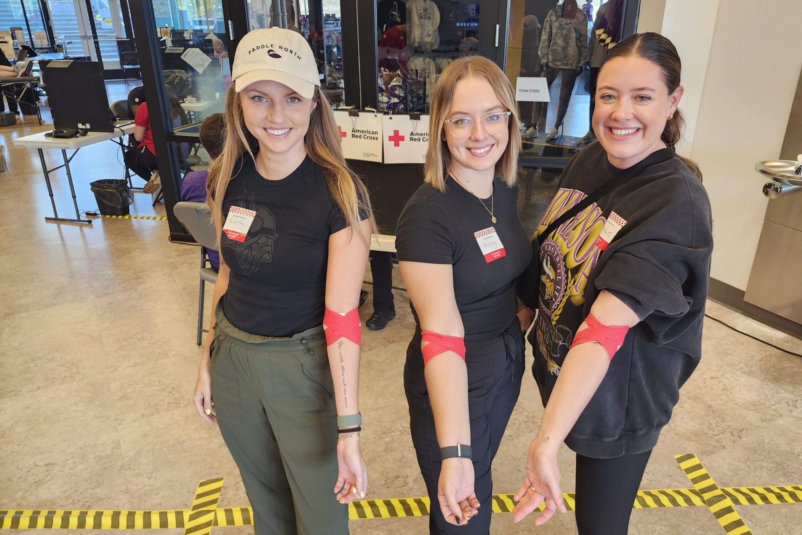 Elizabeth, Ashley and Jackie, co-workers with the Minnesota Vikings, donated together during the team's GivingTuesday blood drive in partnership with the American Red Cross. Elizabeth reflected that, "Jackie and I were a bit anxious to donate for the first time, so it was really nice to have each other to lean on during the process," adding that it "felt like we were giving back in a meaningful way together. "
