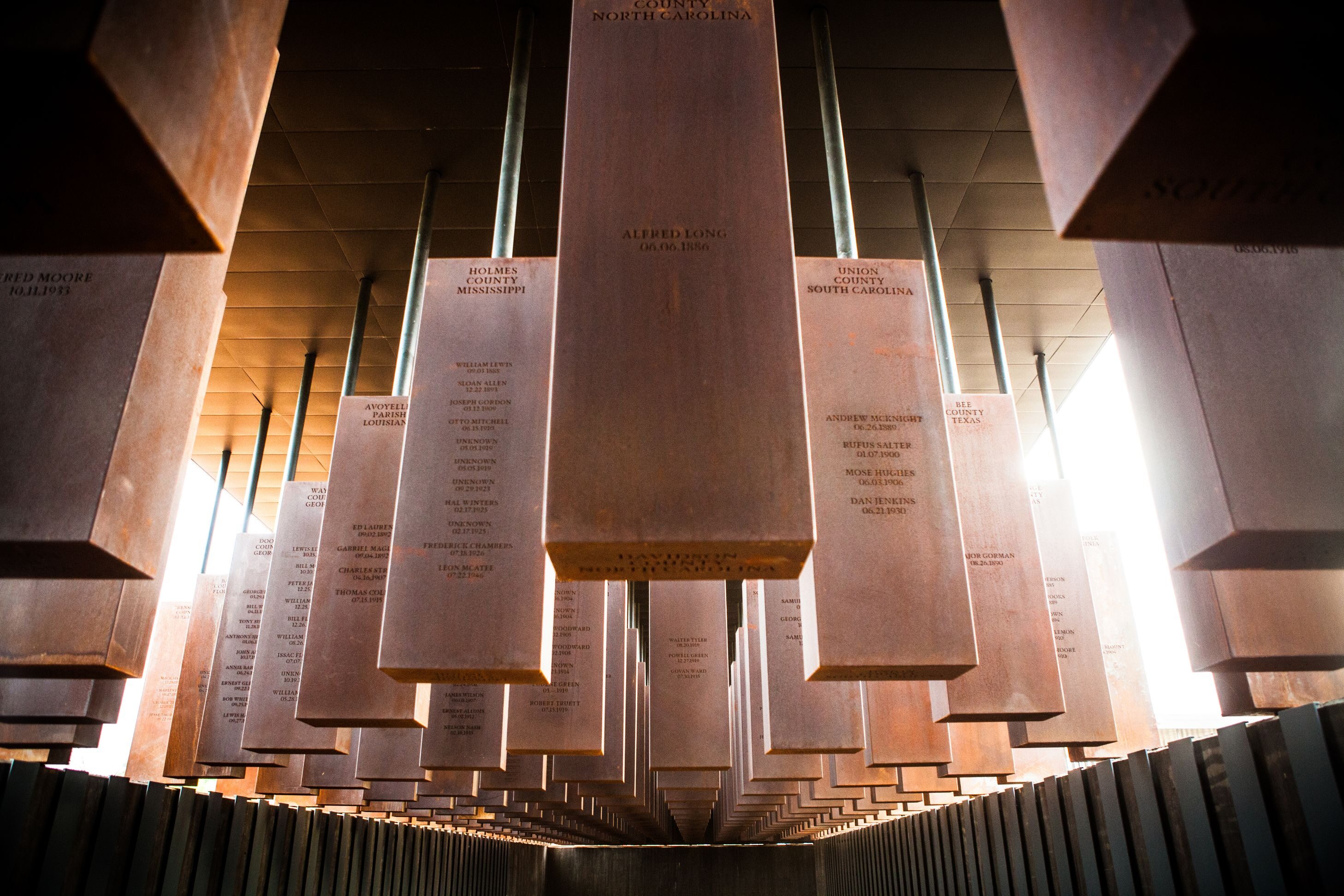 The heart of the National Memorial for Peace and Justice is an installation of steel monuments displaying the names of those killed in racial terror lynchings between 1877 and 1950.