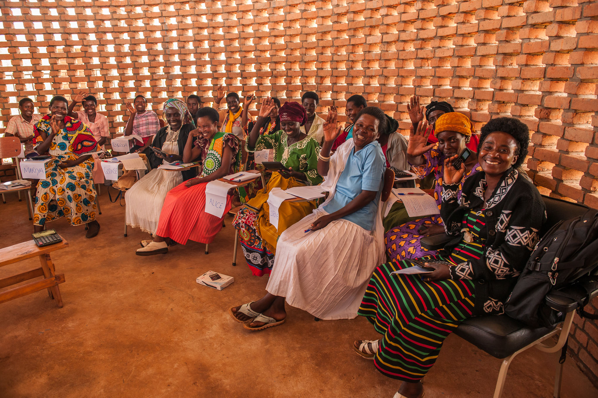 Rwandan coffee producers take classes in financial literacy at an education and community center in the rural Kayonza district. A $10 million Bloomberg Philanthropies grant will expand the program to assist female farmers in Rwanda and the Democratic Republic of Congo.
