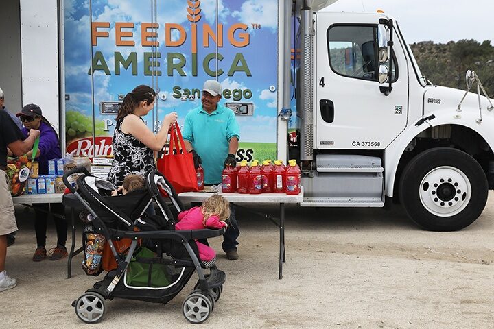FEEDING AMERICA, NO. 3: A Feeding America mobile pantry makes one of its twice-monthly deliveries to needy residents in Jacamba Hot Springs, California, on the U.S.-Mexico border. The hunger-relief charity raised more than $2.1 billion from private sources last year.