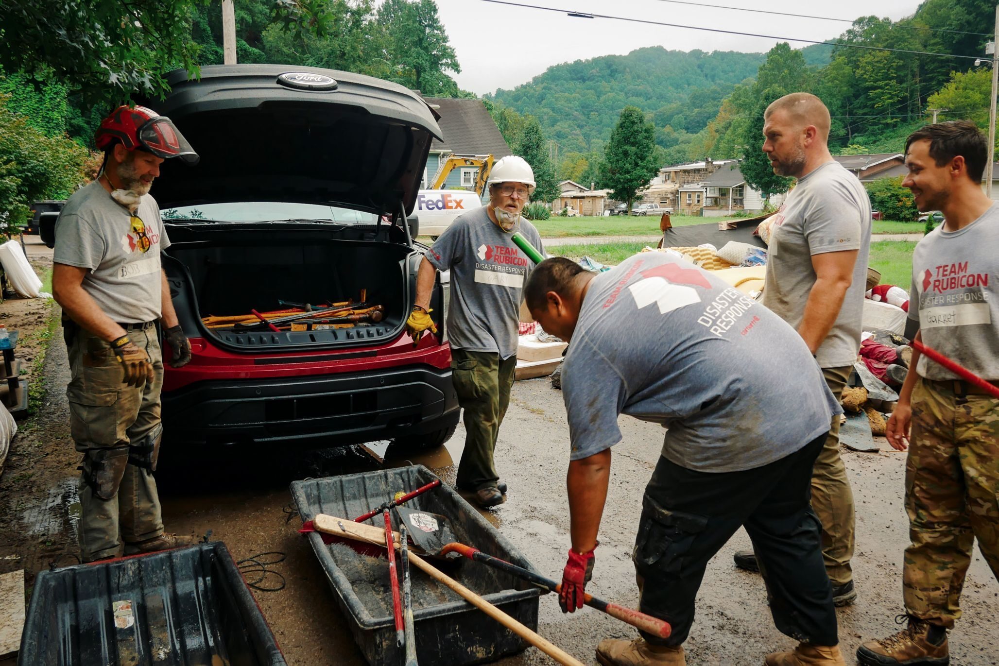During crises like last year’s flooding in Kentucky, Team Rubicon, a disaster-recovery group, relies on electric and hybrid trucks to charge chainsaws, power a home, and even run a mobile command center.