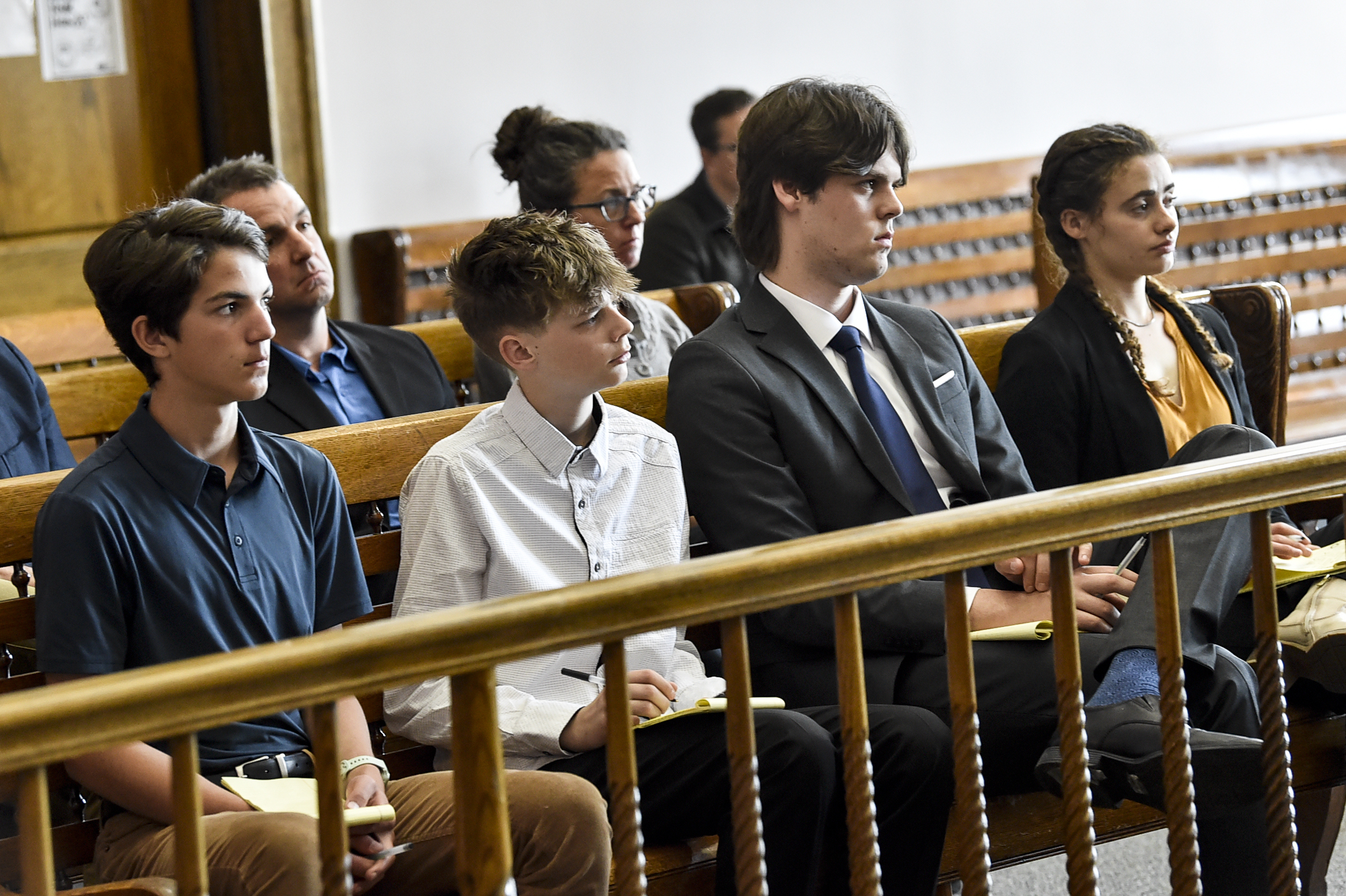 Plaintiffs Mica, 14; Badge 15, Lander 18, and Taleah, 19, listen to arguments during a status hearing on May 12, 2023, in Helena, Mont., for a case that they and other Montana youth filed against the state arguing Montana officials are not meeting their constitutional obligations to protect residents from climate change. The first-of-its-kind trial begins Monday, June 12, 2023, before District Court Judge Kathy Seeley in Helena. It is scheduled to last for two weeks.