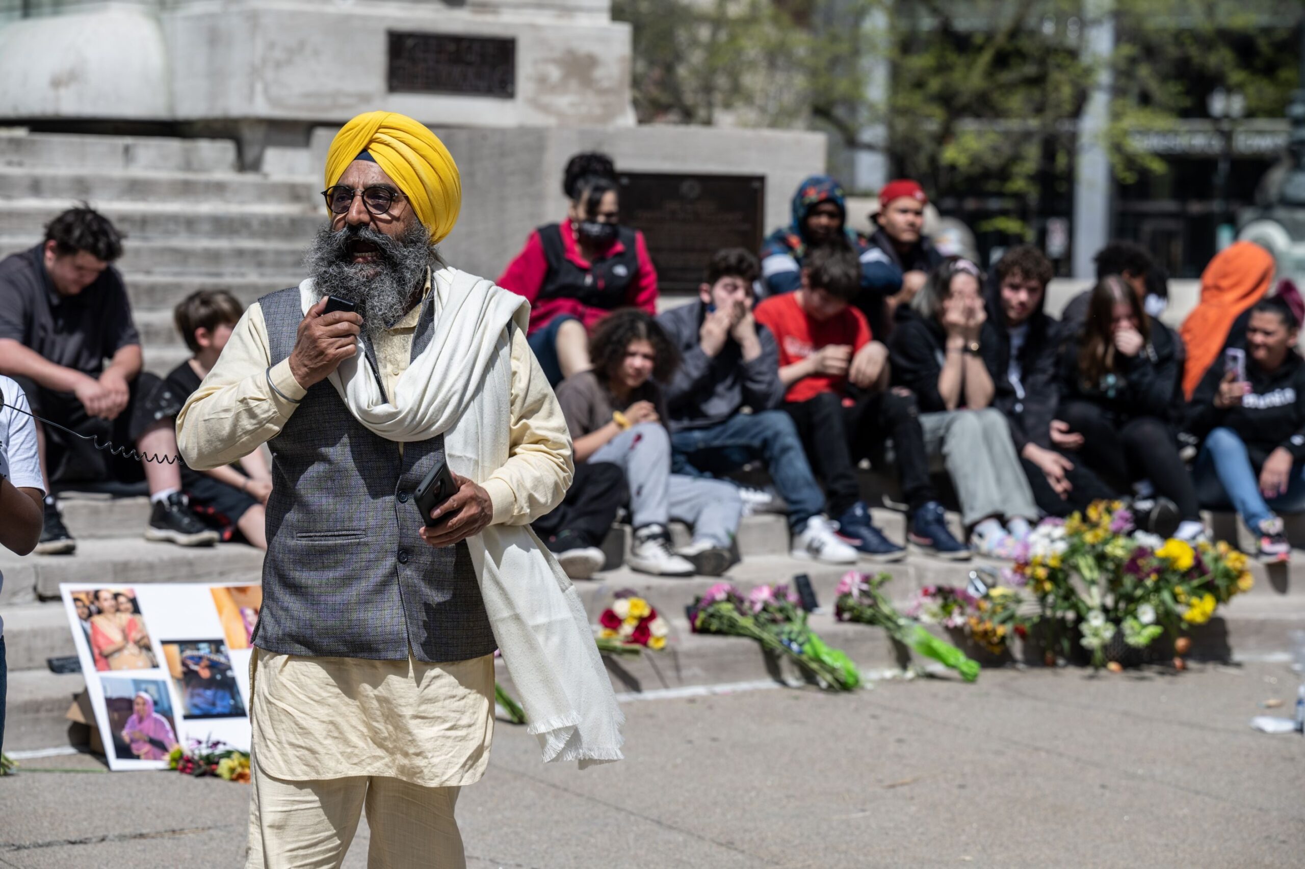 Maninder Singh Walia, a leader of the Sikh coalition of the Sikh Satsang of Indianapolis, speaks during a vigil at Monument Circle for the victims of the mass shooting at the FedEx facility on April 18, 2021 in Indianapolis, Indiana.  Four of the eight victims of the April 15 shooting were Sikh. According to reports, the shooter, Brandon Hole, purchased the two assault weapons he used in the shooting even after having a shotgun confiscated by the FBI in a previous investigation.