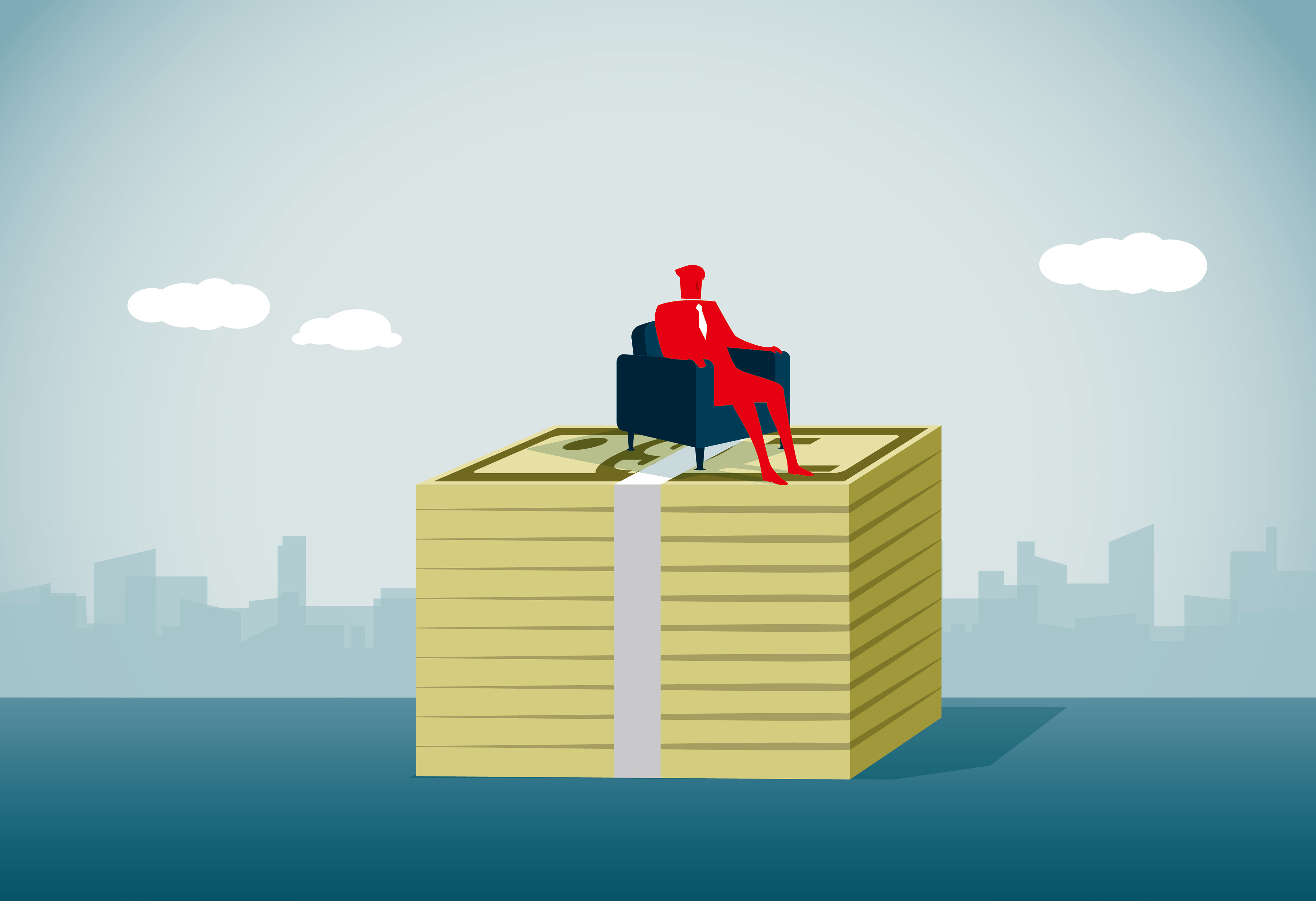 Wealthy man seated on stack of currency. (Getty Images)