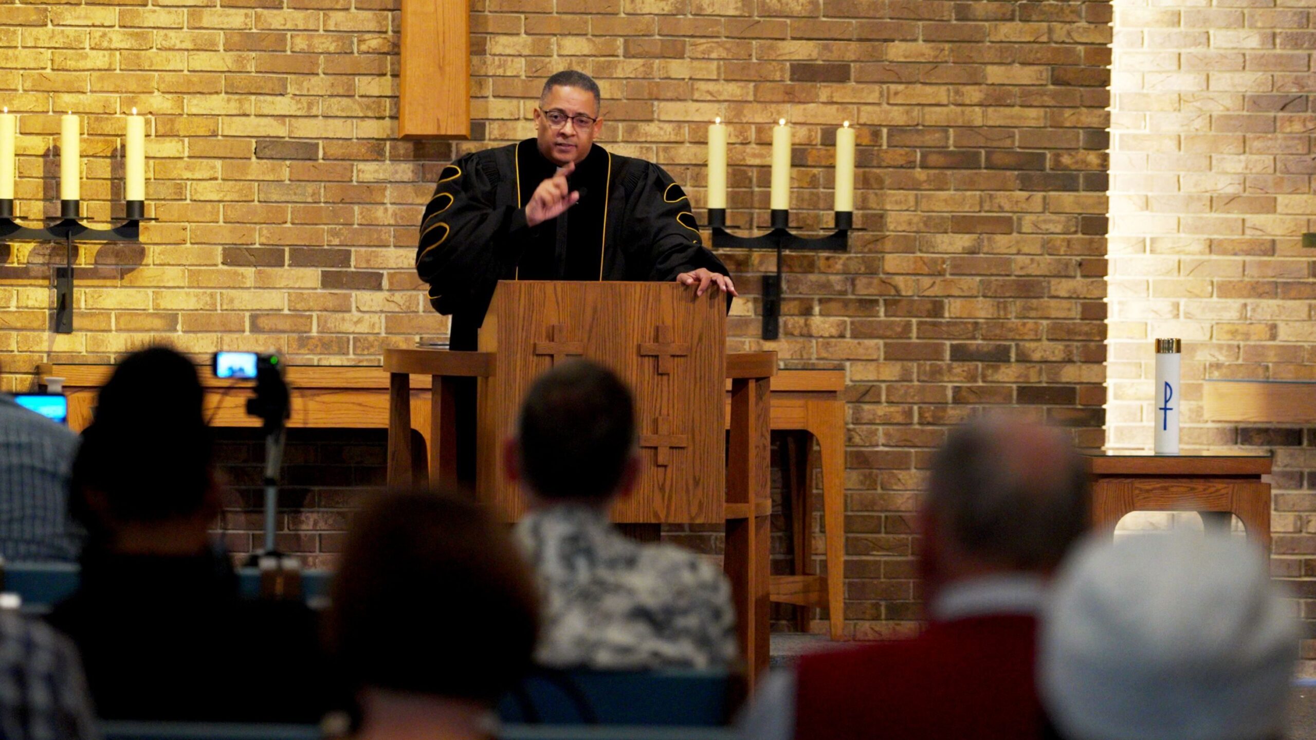 Rev. Dr. Ron Beauchamp leads a service for the Hope Presbyterian congregation.