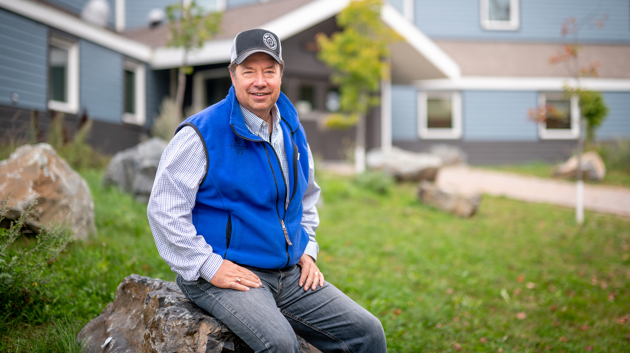 Pete Smerud in front of Wolf Ridge Environmental Learning Center in Finland, Minnesota. Credit: Wolf Ridge Environmental Learning Center