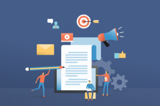 Illustration showing people creating and marketing content. A large document on a tablet is central, with figures writing, working on a laptop, and presenting. Surrounding icons include a target, megaphone, video player, email, thumbs-up, and gears, representing strategy and promotion.