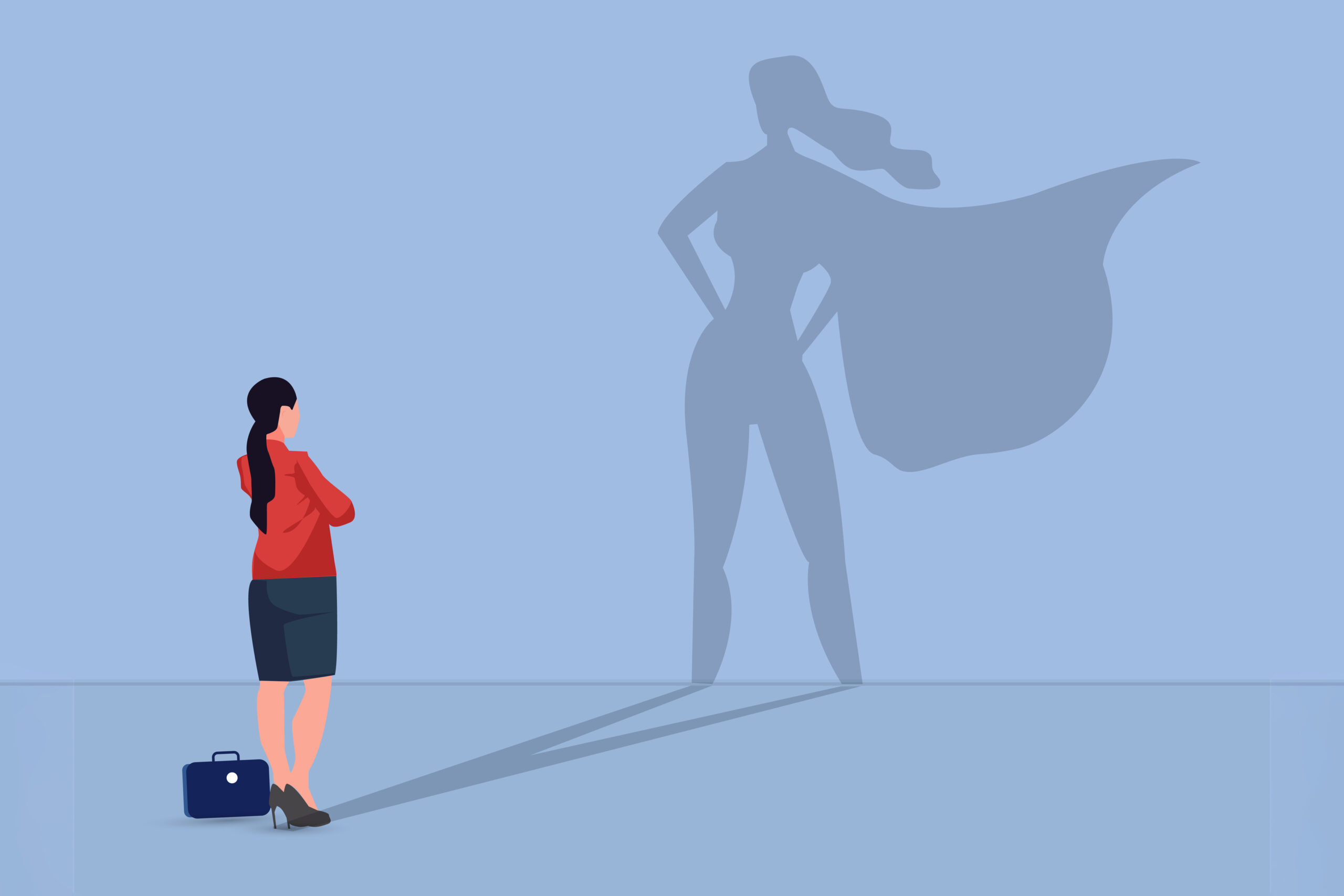 A businesswoman in a red top and blue skirt stands looking at her shadow, which is depicted as a superhero with a cape and hands on hips, against a light blue background.