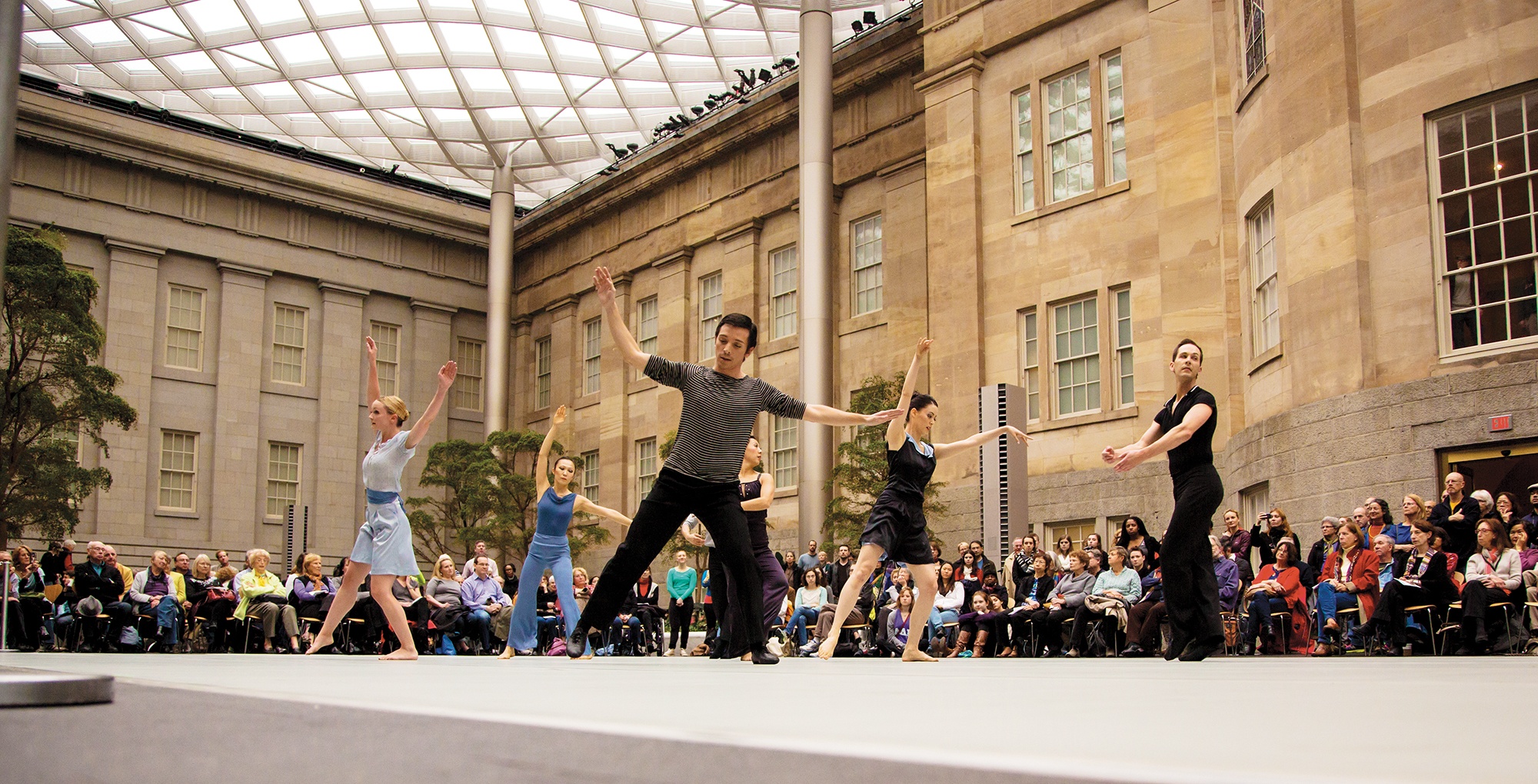 The Face of Philanthropy: Dancers at an Exhibition